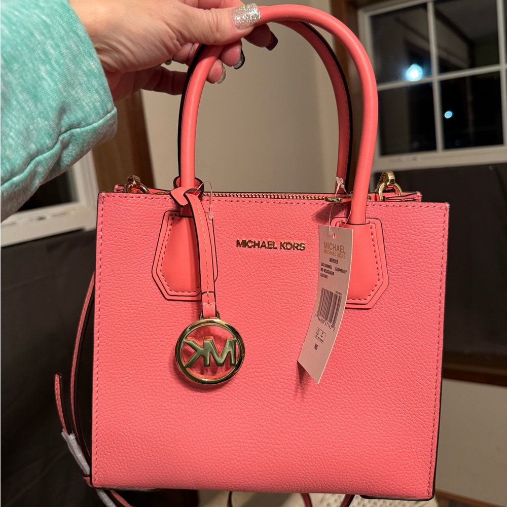 Brand new. MK.